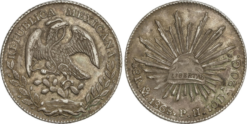 World Coins
8 Reales. 1868-P.H. CIUDAD DE MÉXICO. 26,94 grs. Pátina oscura. KM-...