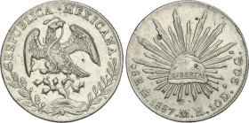 World Coins
8 Reales. 1887. MÉXICO. M.H. 26,81 grs. AR. Pequeños resellos. KM-377.10. EBC-.