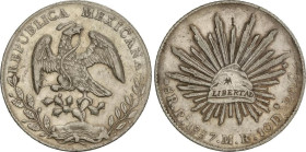 World Coins
8 Reales. 1887. SAN LUIS de POTOSÍ. M.R. 26,8 grs. AR. Pequeños resellos. (Rayitas). KM-377.12. MBC+.