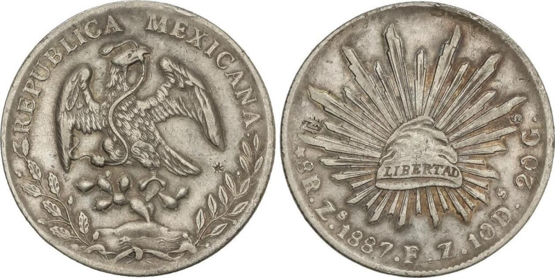 World Coins
8 Reales. 1887. ZACATECAS. F.Z. 26,84 grs. AR. (Pequeños resellos c...