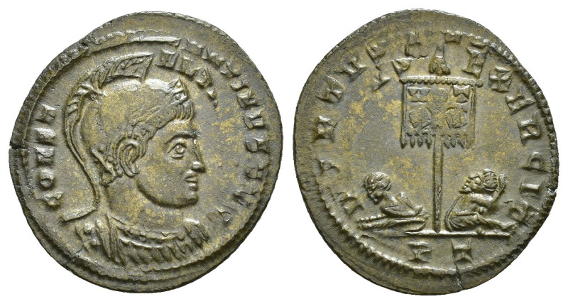 IMPERIO ROMANO. CONSTANTINO. Follis. Ticinum (319-320). A/ Busto con casco y cor...