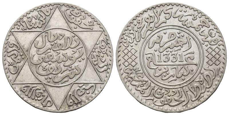 MONEDAS EXTRANJERAS. MARRUECOS. Yusuf. 5 dírhams. París. 1331 H. AR 12,43 g. 31,...