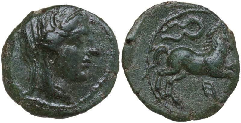 Sicily. Morgantina. AE Half Unit. Punic occupation, c. 214-211 BC. Obv. Veiled a...