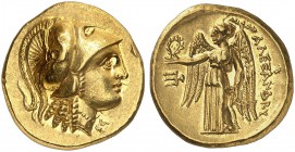 COINS OF THE GREEK WORLD. MACEDONIAN EMPIRE. Alexander III, 336-323. Gold stater c. 330-320 BC, Amphipolis. Head of Athena to right, wearing Corinthia...