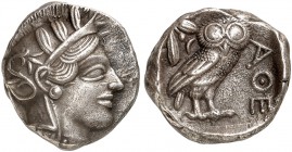 COINS OF THE GREEK WORLD. ATTICA. Athens. Tetradrachm c. 430-420 BC. Head of Athena to right, wearing crested Attic helmet decorated with three olive ...