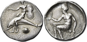 Calabria, Tarentum. 
Nomos circa 425-415, AR 7.99 g. Dolphin rider l., extending r. hand and holding shield in l.; below, pecten. Rev. Oecist seated ...