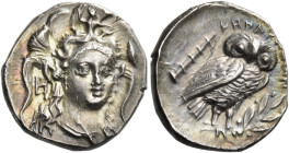 Lucania, Heraclea. 

Drachm circa 281-278, AR 3.69 g. Head of Athena, three-quarters facing r., wearing Attic helmet decorated with Scylla; in inner...