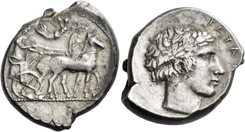 Catana. 
Tetradrachm circa 425-420, AR 17.25 g. Slow quadriga driven r. by char...
