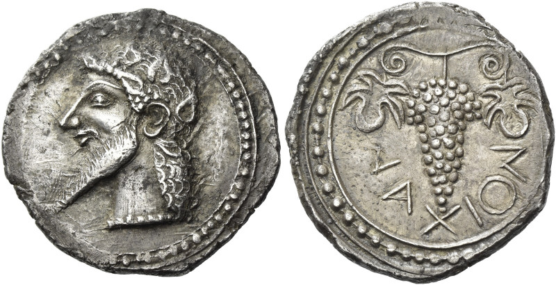 Naxos. 
Chalcidian drachm circa 500, AR 5.95 g. Ivy-wreathed head of Dionysus l...