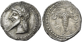 Naxos. 
Chalcidian drachm circa 500, AR 5.95 g. Ivy-wreathed head of Dionysus l., with pointed beard and hair in form of dots, falling in waves over ...