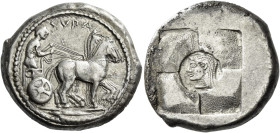 Syracuse. 
Tetradrachm circa 510-490, AR 16.82 g. SVRA Slow quadriga driven r. by clean-shaven charioteer, wearing long chiton and holding reins in e...
