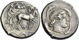 Syracuse. 
Tetradrachm circa 460-440, AR 17.52 g. Slow quadriga driven r. by charioteer, holding kentron and reins; above, Nike flying r. to crown ho...