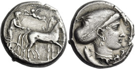 Syracuse. 
Tetradrachm circa 420, AR 17.23 g. Slow quadriga driven r. by charioteer holding reins and kentron; in field above, Nike flying l. to crow...