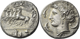 Syracuse. 
Decadrachm unsigned by Euainetos circa 400, AR 41.85 g. Fast quadriga driven l. by charioteer, holding reins and kentron; in field above, ...
