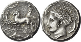 Syracuse. 
Tetradrachm, unsigned dies in the style of Eukleidas circa 400/395-390, AR 17.27 g. Charioteer, holding kentron and reins, driving fast qu...