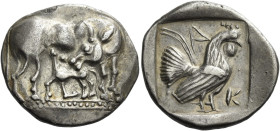 Euboea. Carystus. 
Didrachm circa first half of V century BC, AR 8.45 g. Cow standing r., head turned back towards its calf suckling l. Rev. K – A Co...