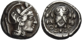 Attica, Athens. 
Hemidrachm circa 454-404, AR 2.13 g. Head of Athena r., wearing crested helmet decorated with olive leaves and spiral palmette. Rev....