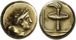 Mytilene. 
Hecte circa 377-326, EL 2.54 g. Half-length bust of Maenad, hair in sphendone, r. Rev. Race torch in linear square within shallow incuse s...