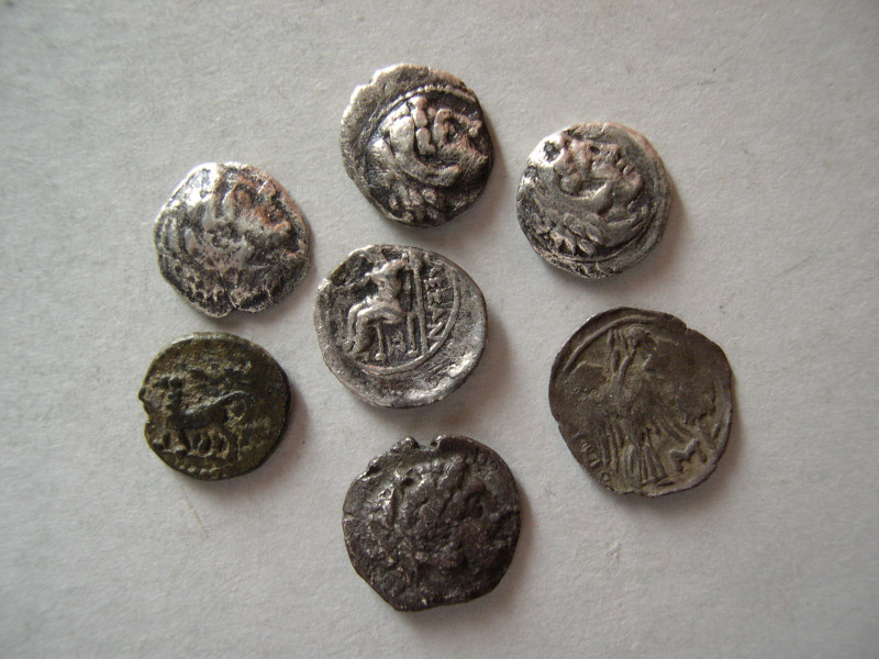 GROUP LOT OF 7 ANCIENT AR Obols. Lot includes 5 Alexander III obols, 1 Seleukos ...