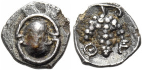 BOEOTIA. Thebes. Circa 405-395 BC. Tetartemorion (Silver, 7 mm, 0.23 g). Boeotian shield. Rev. ⨀-Ε Bunch of grapes on branch. BCD Boiotia 468c. HGC 4,...