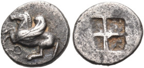 CORINTHIA. Corinth. Circa 550-500 BC. Obol (Silver, 8 mm, 0.37 g). Ϙ Pegasos with curved wing flying left. Rev. Quadripartite incuse square, lacking t...