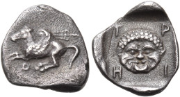 CORINTHIA. Corinth. Circa 450-415 BC. Trihemiobol (Silver, 11 mm, 0.65 g, 7 h). Ϙ Pegasos, with curved wing, flying to left; above right, trident to l...