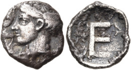 ARKADIA. Heraia. late 5th-early 4th centuries BC. Obol (Silver, 11 mm, 0.73 g, 7 h). Head of Artemis to left, her hair rolled and bound with a taenia;...