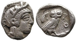 Greek
ATTICA. Athens. (Circa 454-404 BC).
AR Obol (9.1mm 0.64g)
Obv: Helmeted head of Athena right.
Rev: AΘE.Owl standing right, head facing; oliv...