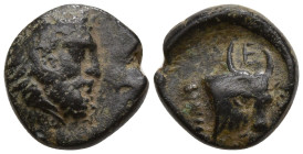 Greek
IONIA. Erythrai. (circa 400-370 BC).
AE Bronze (13.5mm 1.05g)
Obv: Head of Herakles to right, wearing lion skin headdress
Rev: Head of bull;...