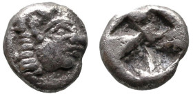 Greek
IONIA. Kolophon. (Circa 530/25-500 BC). Persic standard.
AR Hemiobol (7.1mm 0.49g).
Obv: Archaic head of Apollo right
Rev: Incuse square pun...