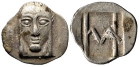 Greek
IONIA. Kolophon. Circa 450-410 BC.
AR Hemiobol (8.9mm 0.3g).
Obv: Facing head of Apollo with long hair
Rev: Monogram of HM (mark of value) w...