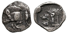 Greek
MYSIA. Kyzikos. (Circa 450-400 BC).
AR Tetartemorion (6.8mm 0.18g)
Obv: Forepart of boar left; tunny to right.
Rev: Head of roaring lion lef...