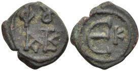 Byzantine
Justin II (565-578 AD). Kyzikos
AE Pentanummium (18.4mm 1.82g)
Obv: Monogram of Justin II
Rev: Large E, K in right field
Sear 375.