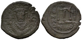 Byzantine
Tiberius II Constantine (578-582 AD). Nicomedia. Dated RY (581/2AD)
AE Follis (28.8mm 12.45g)
Obv: Crowned bust facing, wearing consular ...