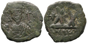 Byzantine
Phocas (602-610 AD). Nicomedia
AE Half follis (22.1mm 5.01g)
Obv: Crowned and cuirassed facing bust, holding mappa and cross
Rev: Large ...