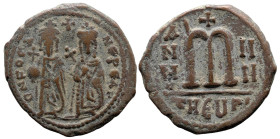 Byzantine
Phocas with Leontia (602-610 AD). Theoupolis (Antioch). Dated RY 4= 605/6 AD
AE Follis (29mm 10.56g)
Obv: D N FOCA NE PE AV, Phocas, crow...