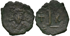 Byzantine
Constantine IV Pogonatus (668-685 AD). Constantinople
AE Decanummium (21.7mm 2.64g).
Obv: Helmeted and cuirassed bust facing slightly rig...