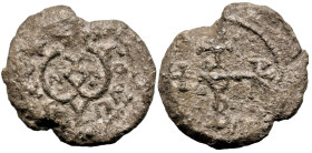 Byzantine Lead Seal
John Apo Eparchon (7th century)
Obv: Cruciform invocative monogram (type V). Wreath border.
Rev: Monogram in the center: Ἰωάννο...