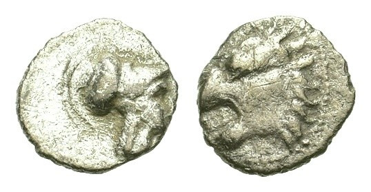 Pamphylia, Side, 4th century BC. AR Obol (8,8mm, 0.53g). Lion?s head l. R/ Helme...