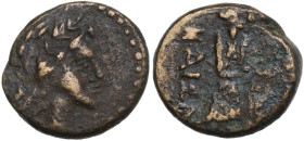 Uncertain mint (Caesarea?), c. 3rd-1st century BC. Æ (14mm, 3.16g). Laureate head (of Apollo?) r. R/ Figure standing r. Fine