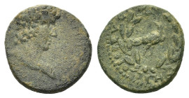 Antinoos, favourite of Hadrian, died 130 AD. Phokis, Delphi. Æ (17mm, 4,44g). Bust of Antinoos r., bare headed. R/ Laurel wreath tying below in which ...