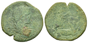 Caracalla (198-217). Uncertain mint. Æ (33mm, 14.91g). Laureate bust r. R/ Artemis standing r., restraining kneeling stag, seizing its horns with both...