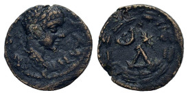 Elagabalus (218-222). Seleucis and Pieria, Antioch. Æ (17,2mm, 4.07g). Laureate bust r., slight drapery on far shoulder. R/ Δ Є, below, star; all with...