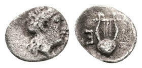 Thraco-Macedonian Region ? Uncertain. AR Obol, 0.32 g 9.35 mm. ( 5th century BC).
Obv: Laureate head of Apollo right.
Rev: Lyre; E (retrograde) in lef...