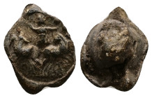 PB Roman provincial conical seal (AD 2nd-3rd centuries)
Obv: Helios standing facing in spread quadriga, raising right hand in salute, holding globe i...