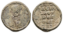 PB Byzantine seal of Basil (AD 10th-11th centuries)
Obv: Bust of a Saint, holding the Gospel and offering a blessing. Illegible sigla.
Rev: Illegible ...