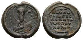 PB Byzantine lead seal of Paul (AD 11th century)
Obv: Half-length of St Paul, turned slightly to his left toward the manus Dei (hand of god), holding...