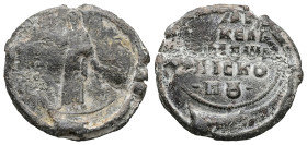 PB Byzantine seal of Symeon bishop and synkellos (AD 11th century)
Obv: St. John the Baptist, standing, holding a long cross. Traces of inscription. B...