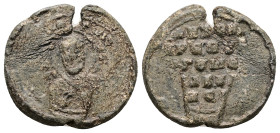 PB Byzantine lead seal (AD 11th century)
Obv: Bust of a Saint, holding the Gospel and offering a blessing. Illegible sigla and circular inscription al...