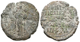 PB Byzantine lead seal (AD 11th century)
Obv: Mother of God standing and holding Christ on her left arm. Circular inscription. Border of dots.
Rev: In...